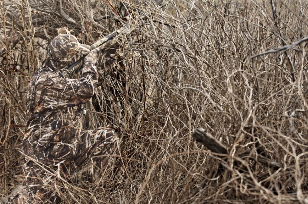 Duck hunter wearing RealTree Hunting Camouflage